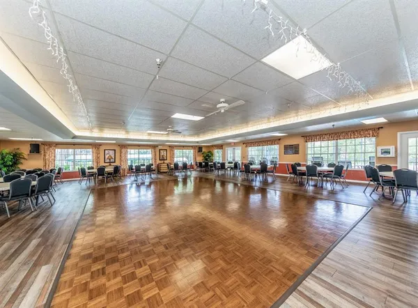 a view of a living room and dining room