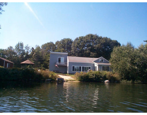 52 Bumpy Lane Methuen, MA 01844 - Photo 1 of 1 a view of a lake with houses