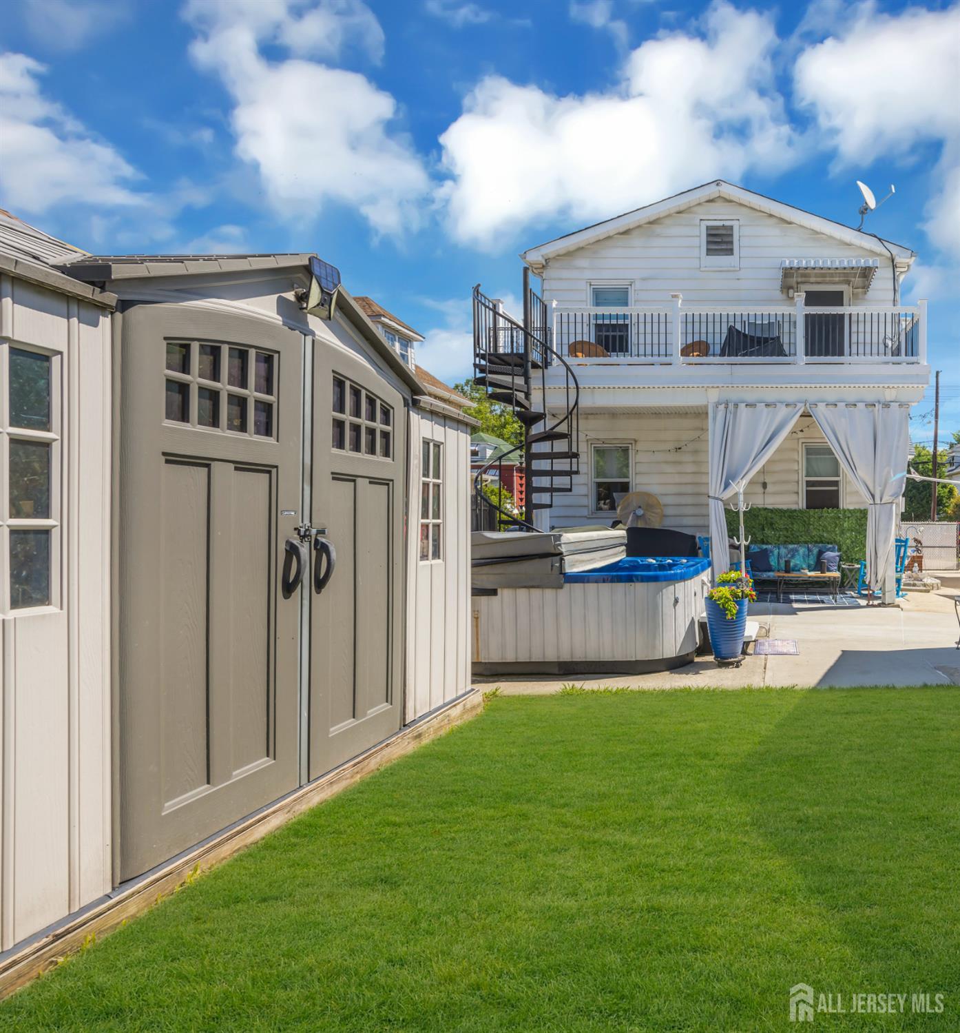 98 William Street South River, NJ 08882 - Photo 52 of 52 a front view of a house with a yard table and chairs