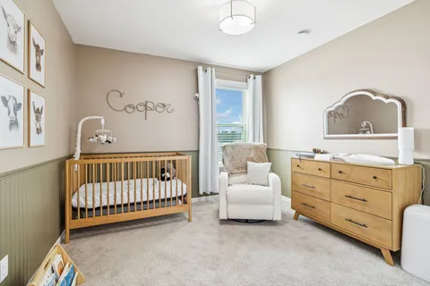 a view of a bedroom with closet