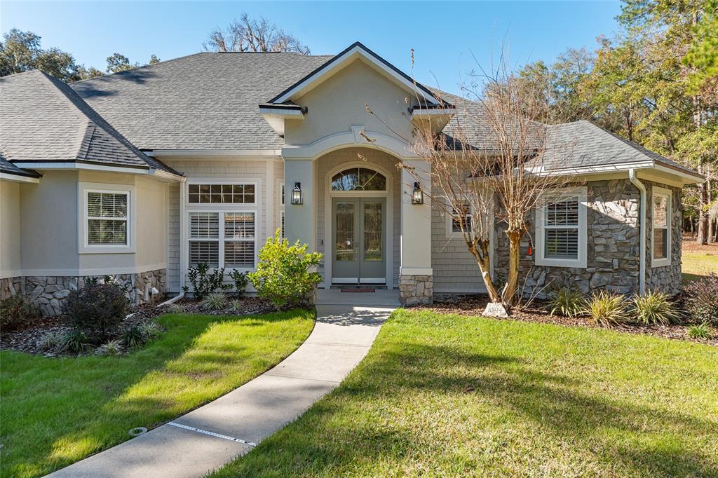 10614 Southwest 15th Lane Gainesville, FL 32607 - Photo 3 of 85 a view of a house with a yard
