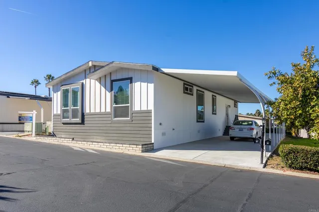 a front view of a house with a garage