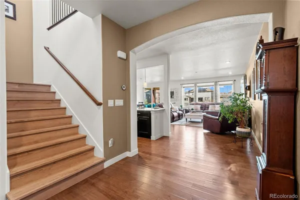 a view of an entryway and livingroom with furniture