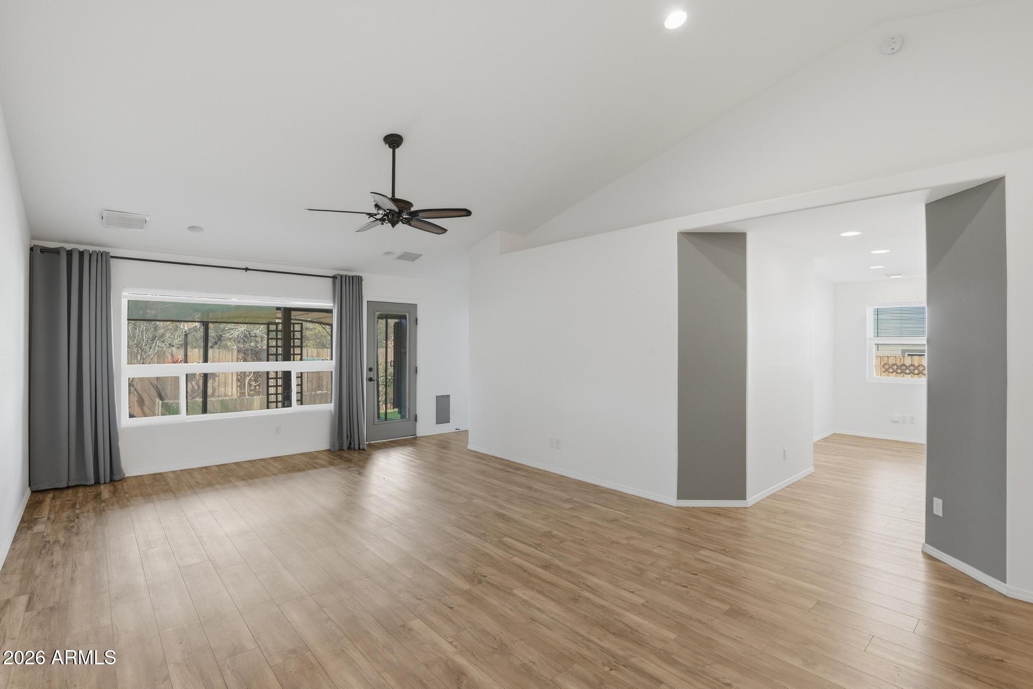 202 North Durango Court Payson, AZ 85541 - Photo 5 of 27 a view of an empty room with a window and wooden floor