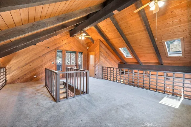 a view of porch with wooden floor