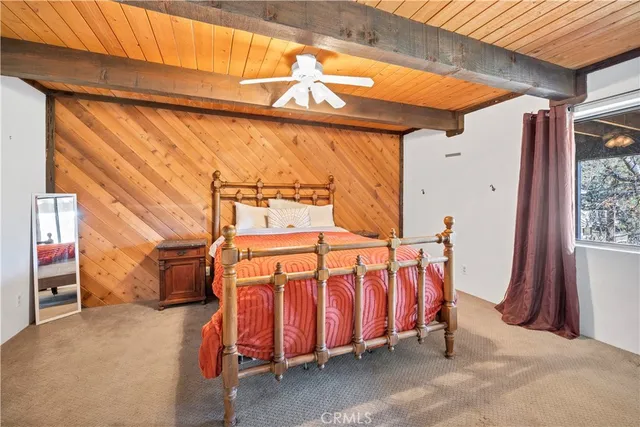 a view of a two chairs in the patio