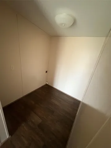 a bathroom with a granite countertop toilet sink and bathtub