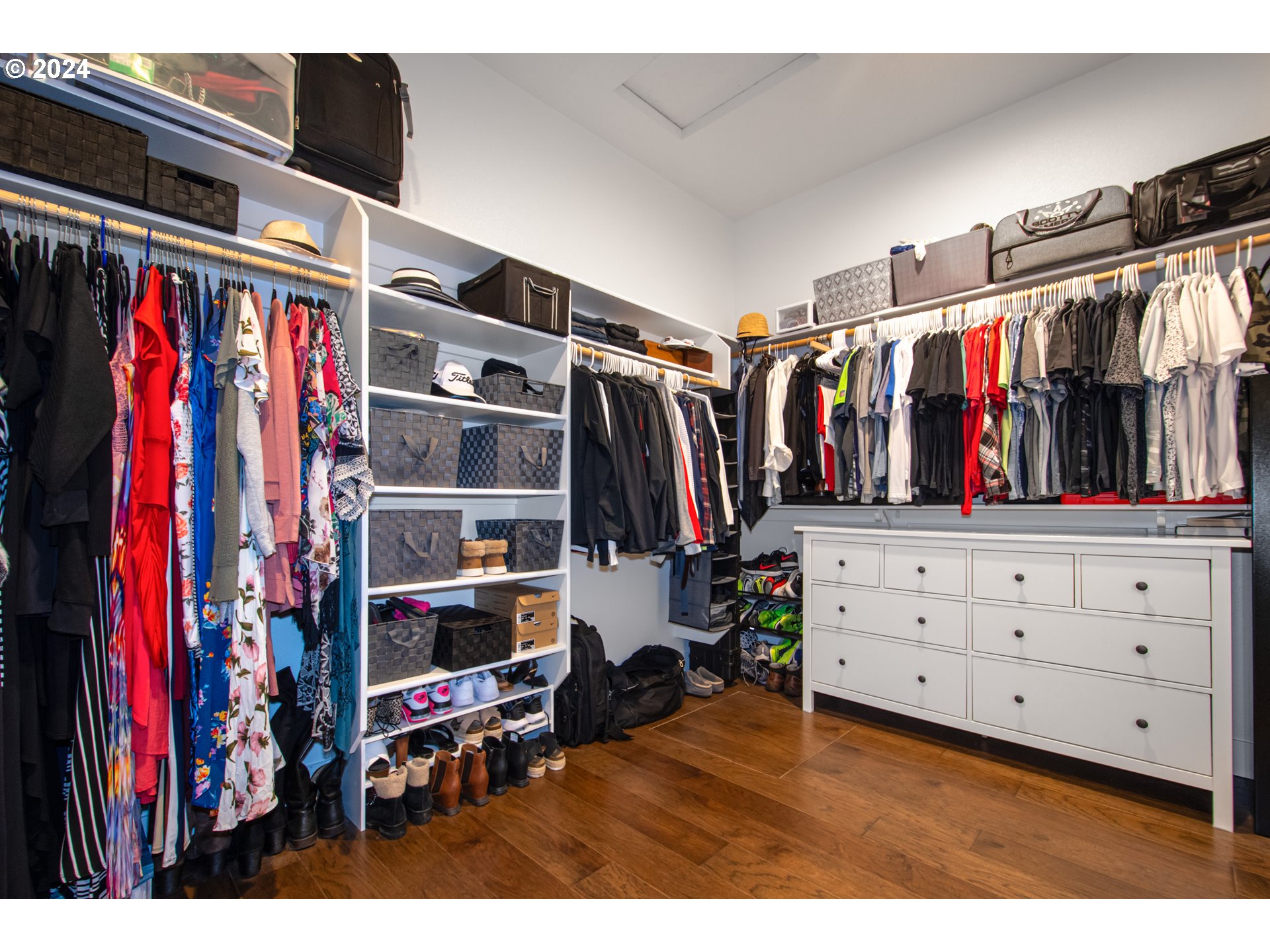 6156 Northwest Olympic Street Camas, WA 98607 - Photo 22 of 29 a view of walk in closet with clothes and shoes