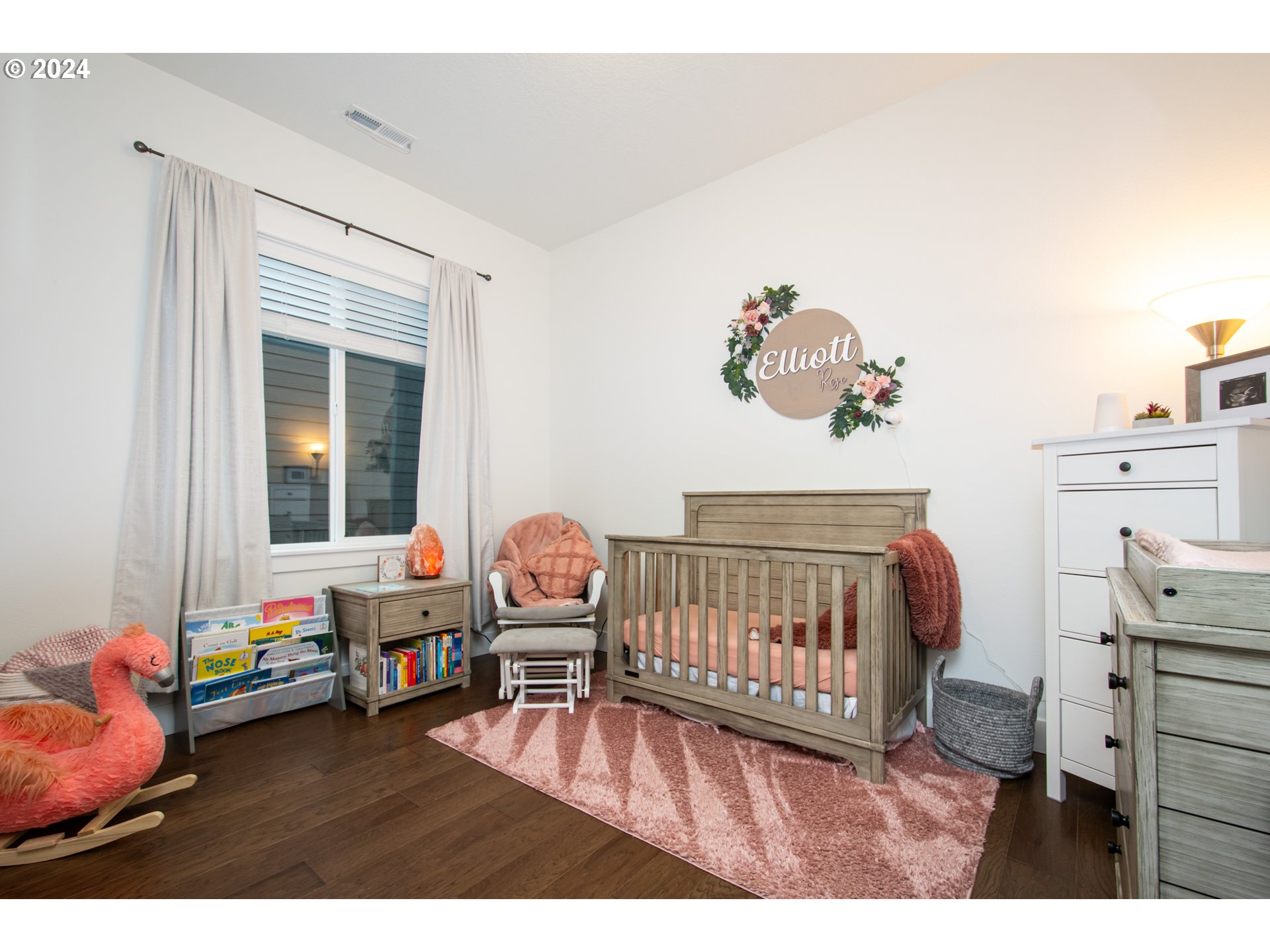 6156 Northwest Olympic Street Camas, WA 98607 - Photo 23 of 29 a bedroom with furniture and a window