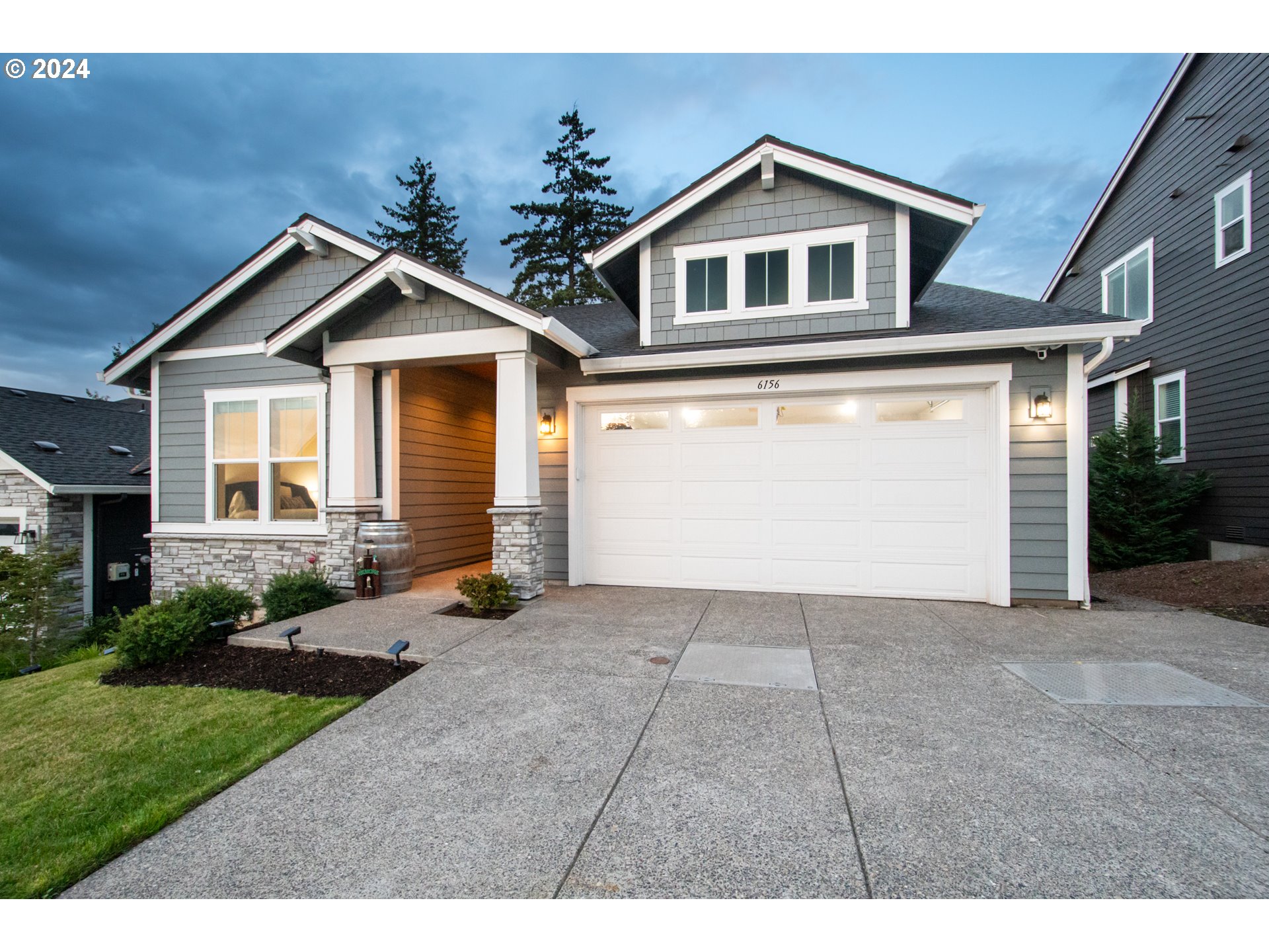 6156 Northwest Olympic Street Camas, WA 98607 - Photo 29 of 29 a view of a house with yard and garage
