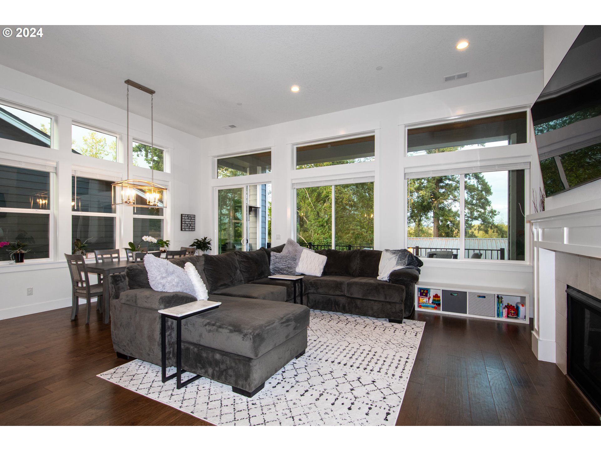 6156 Northwest Olympic Street Camas, WA 98607 - Photo 6 of 29 a living room with furniture and a large window