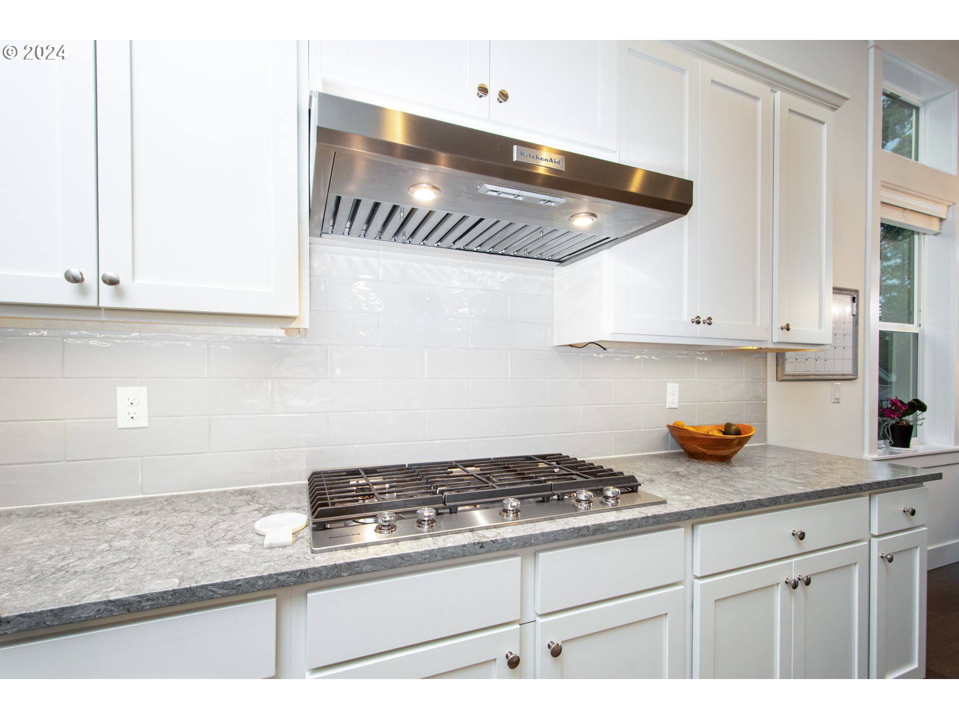 6156 Northwest Olympic Street Camas, WA 98607 - Photo 9 of 29 a kitchen with granite countertop stainless steel appliances stove and cabinets