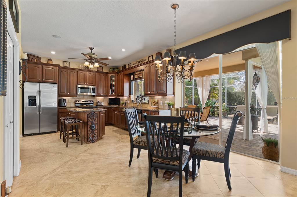 4202 Rotherham Court Palm Harbor, FL 34685 - Photo 17 of 61 a view of a dining room and livingroom view