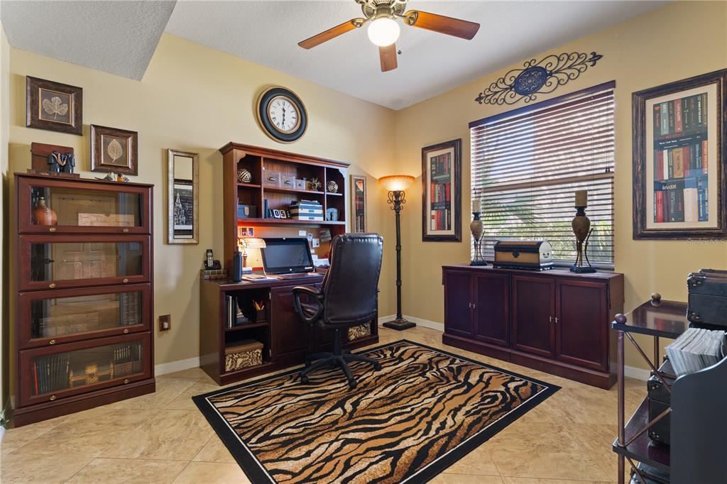 4202 Rotherham Court Palm Harbor, FL 34685 - Photo 22 of 61 a view of a workspace with furniture