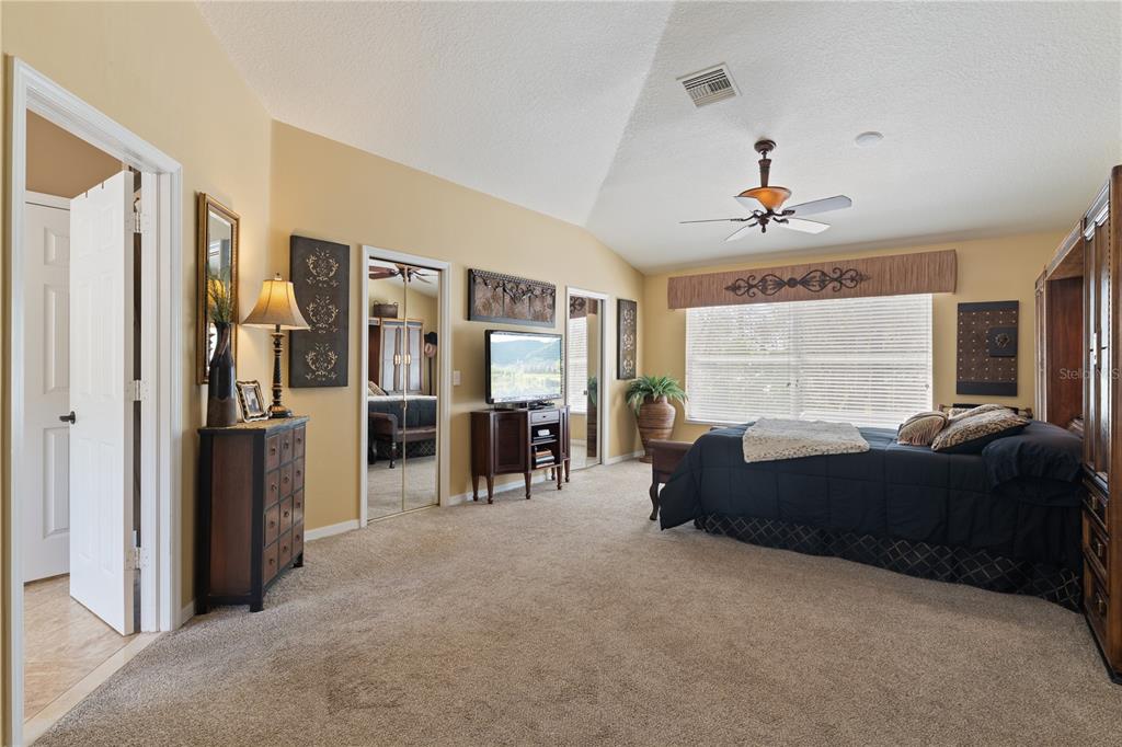 4202 Rotherham Court Palm Harbor, FL 34685 - Photo 32 of 61 a living room with furniture and a window