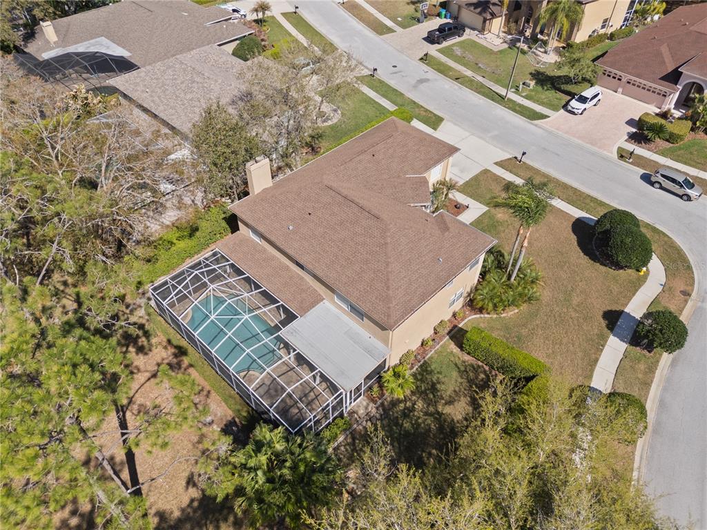4202 Rotherham Court Palm Harbor, FL 34685 - Photo 48 of 61 an aerial view of a house with a yard