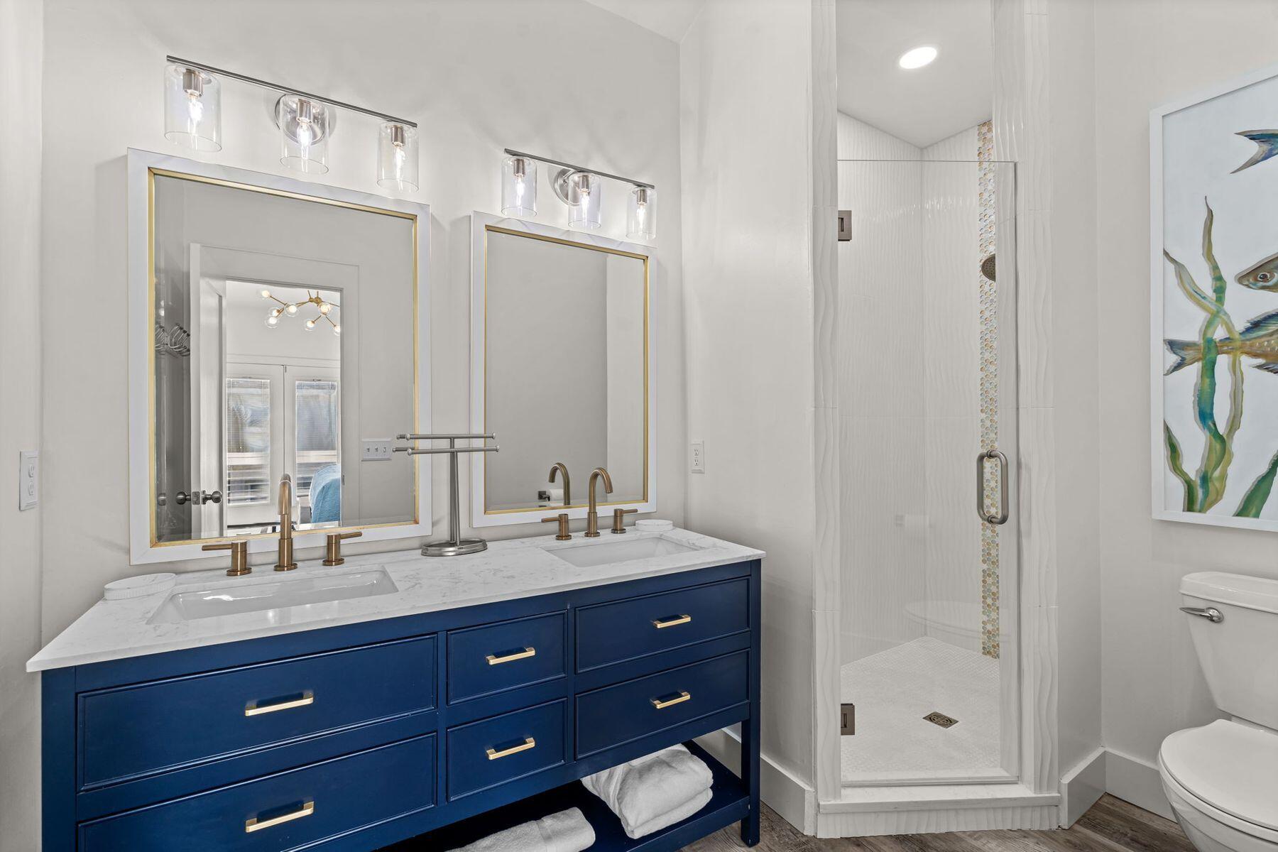 41 Longue Vue Drive Inlet Beach, FL 32461 - Photo 21 of 48 a bathroom with a toilet a sink and shower