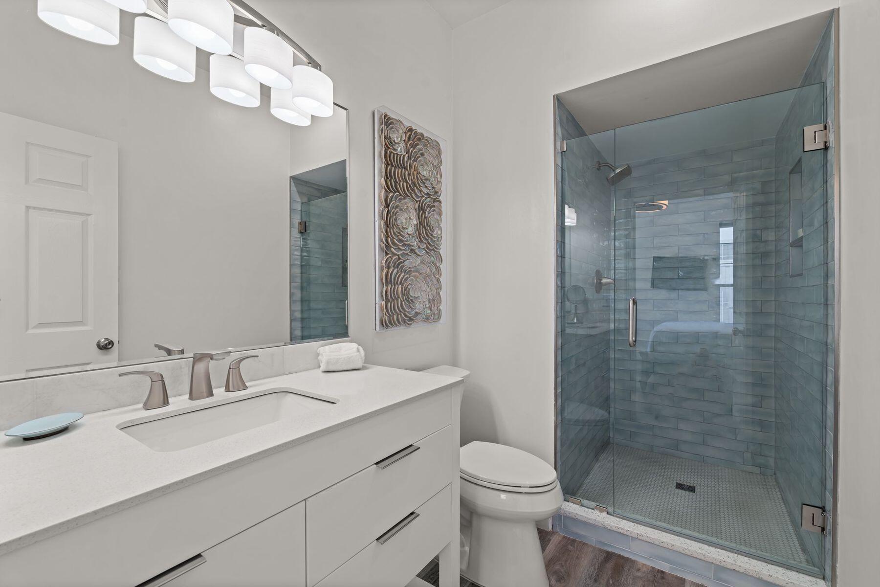 41 Longue Vue Drive Inlet Beach, FL 32461 - Photo 26 of 48 a bathroom with a sink a toilet and shower