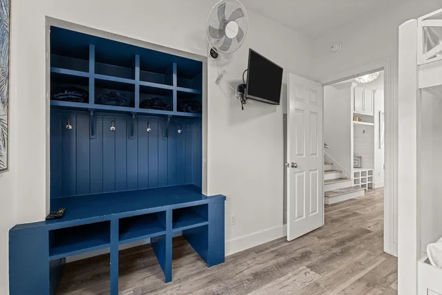 a view of a livingroom with furniture and wooden floor