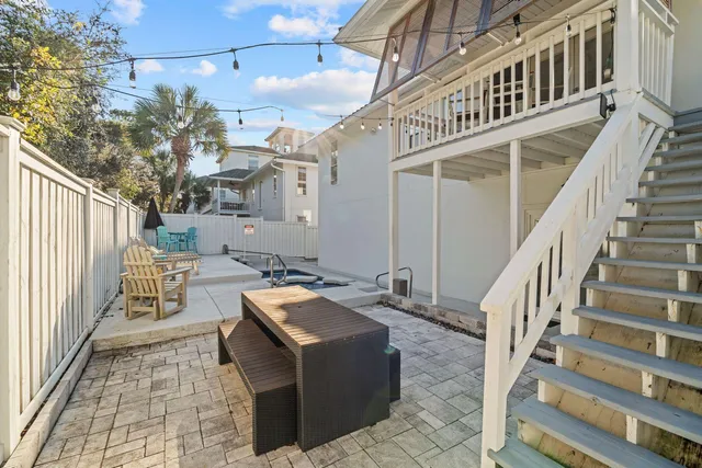 a view of a chairs and tables in the patio