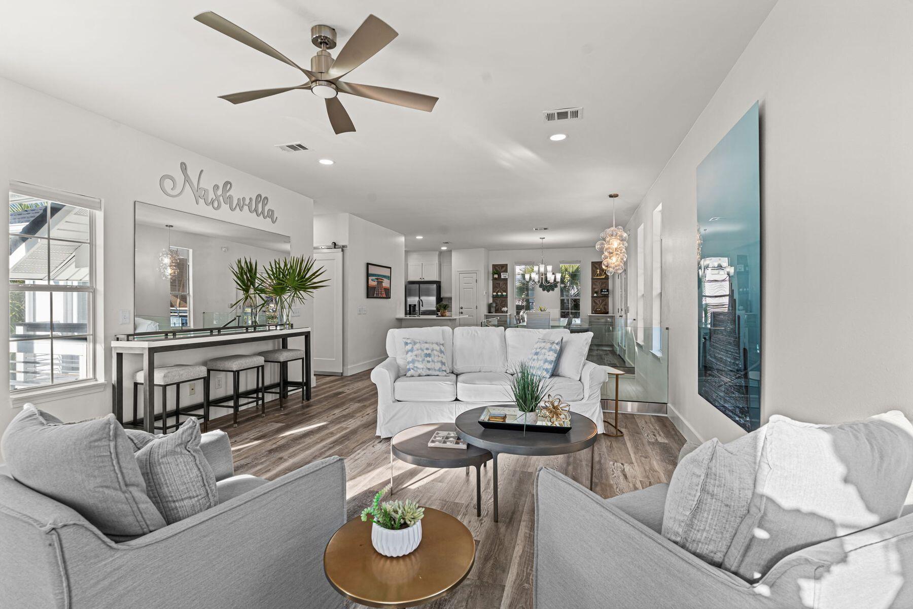 41 Longue Vue Drive Inlet Beach, FL 32461 - Photo 4 of 48 a living room with furniture and a wooden floor