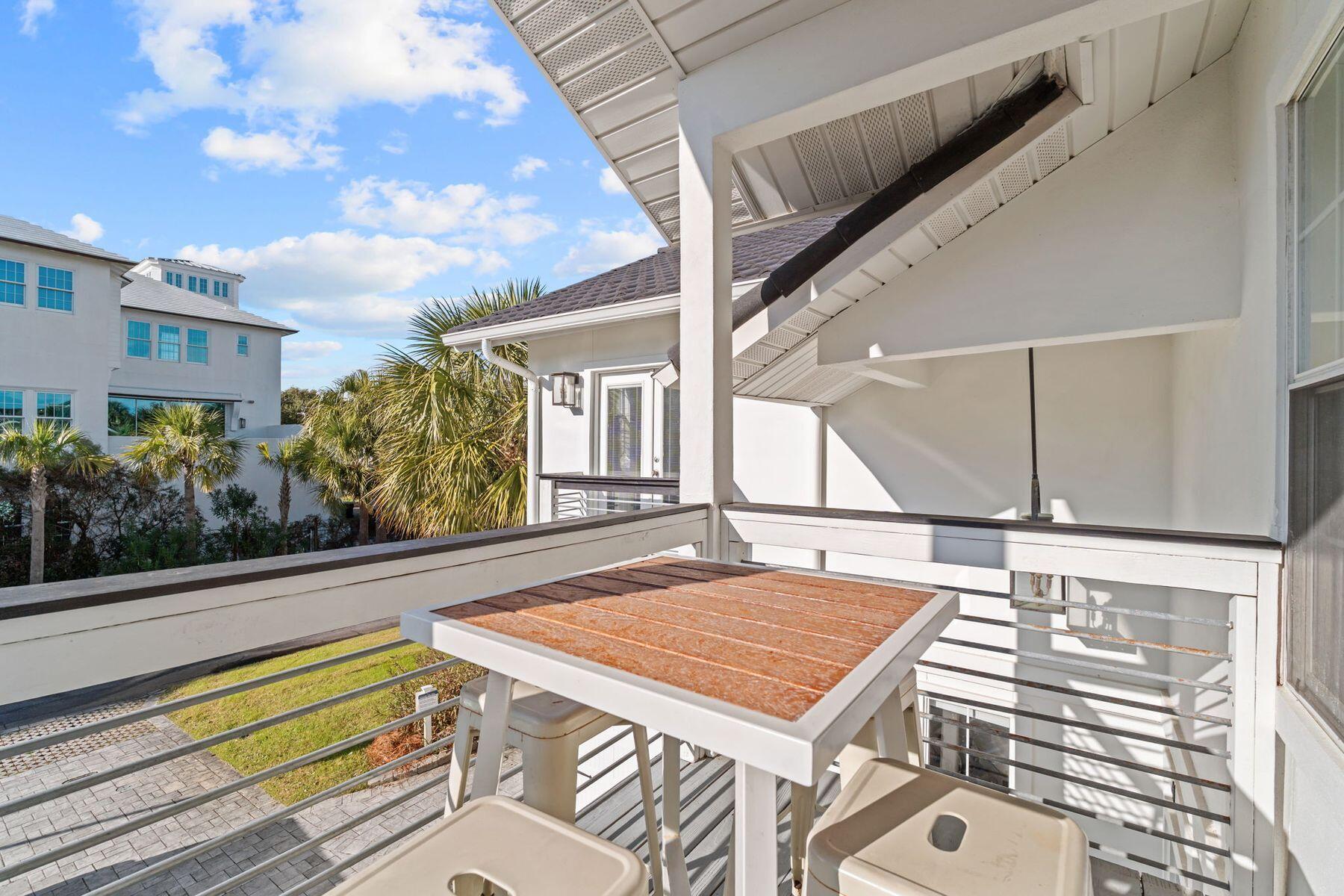 41 Longue Vue Drive Inlet Beach, FL 32461 - Photo 7 of 48 a view of a balcony and floor to ceiling windows