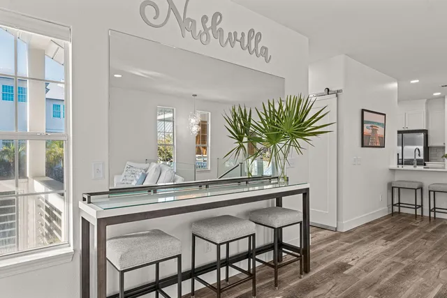 a kitchen with a table and chairs in it