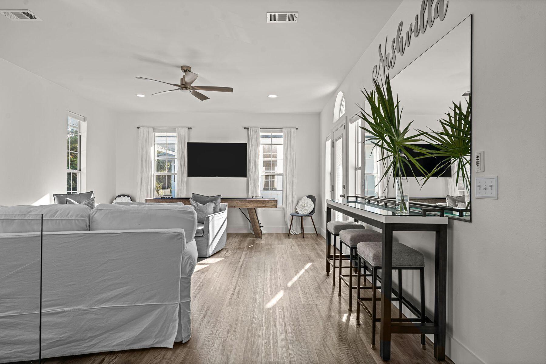 41 Longue Vue Drive Inlet Beach, FL 32461 - Photo 9 of 48 a view of a livingroom with furniture and a flat screen tv