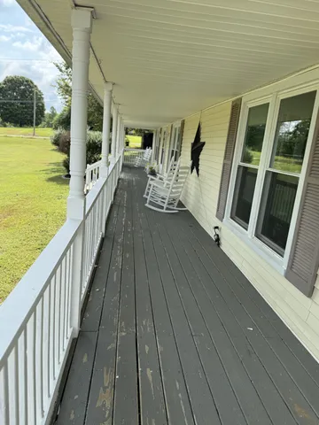 a view of balcony with a ocean view