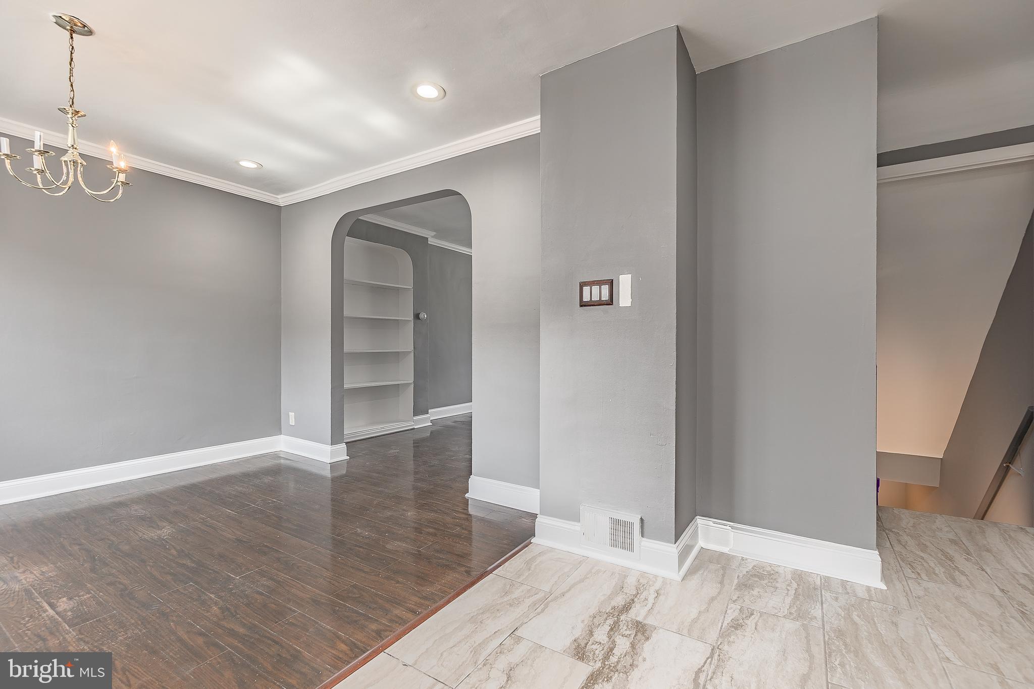 7278 Lamport Road Upper Darby, PA 19082 - Photo 15 of 29 wooden floor in an empty room with a window
