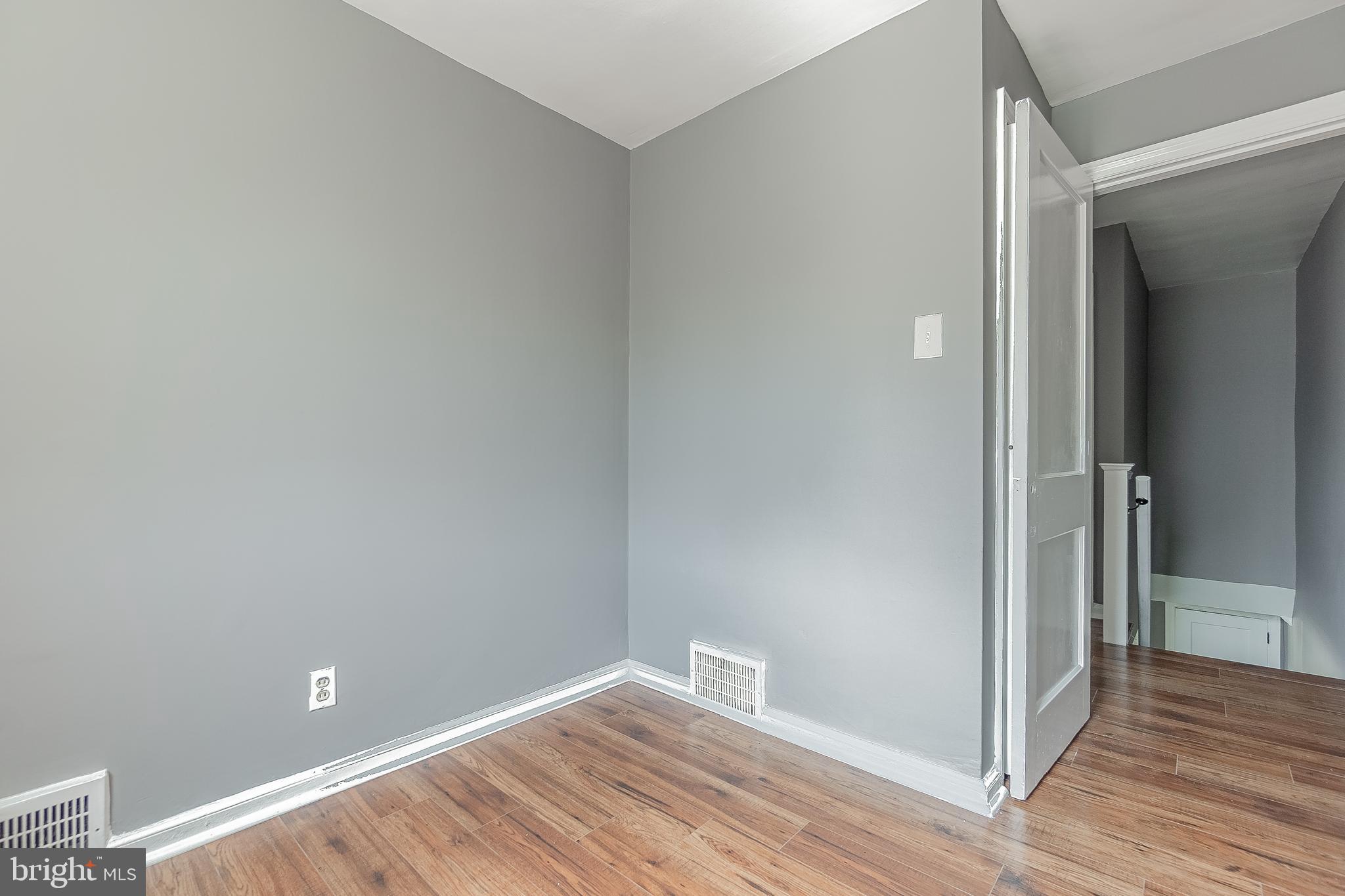 7278 Lamport Road Upper Darby, PA 19082 - Photo 19 of 29 a view of room with wooden floor