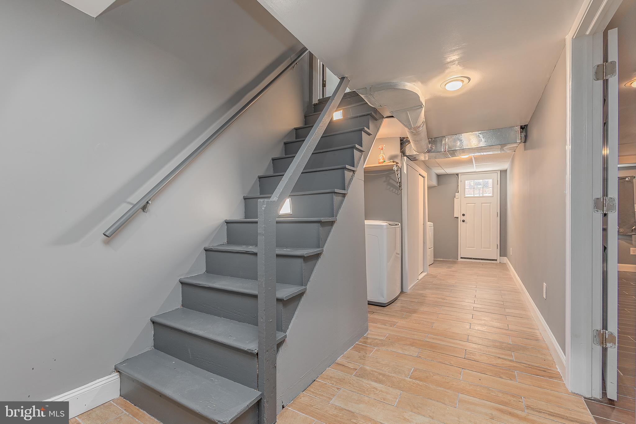 7278 Lamport Road Upper Darby, PA 19082 - Photo 23 of 29 a view of entryway and hall with wooden floor