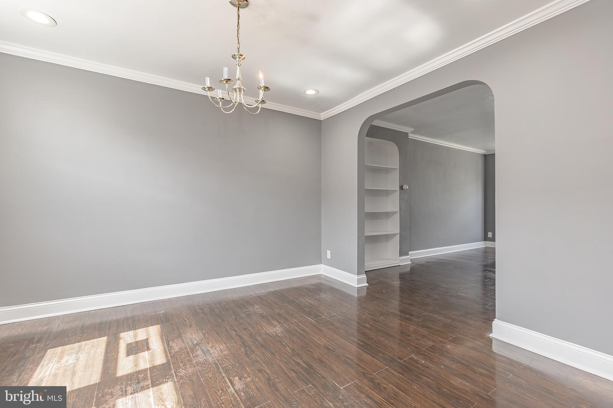 7278 Lamport Road Upper Darby, PA 19082 - Photo 8 of 29 wooden floor in an empty room with a window
