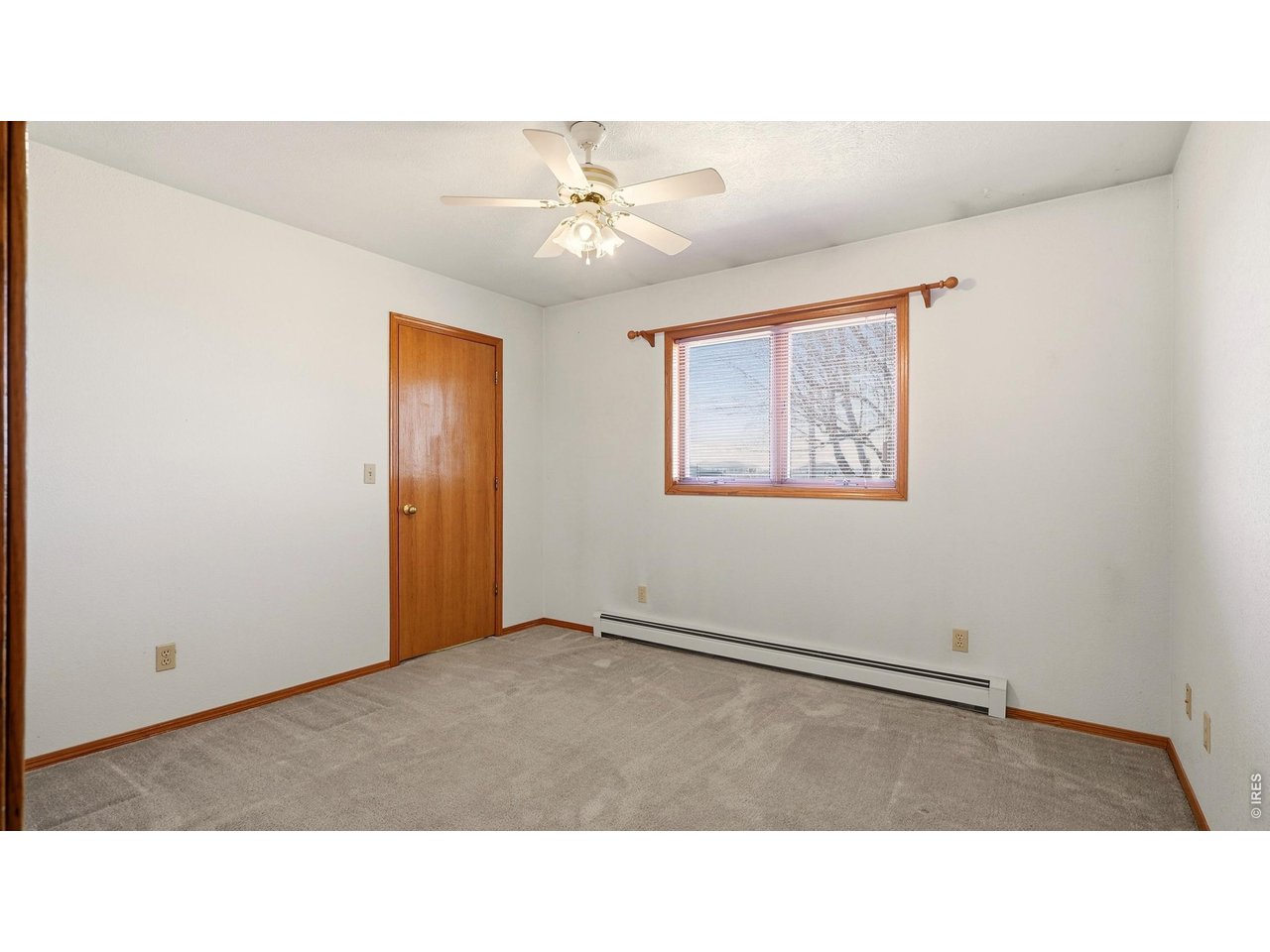 705 Ute Street Fort Morgan, CO 80701 - Photo 12 of 33 a black and white photo of a room