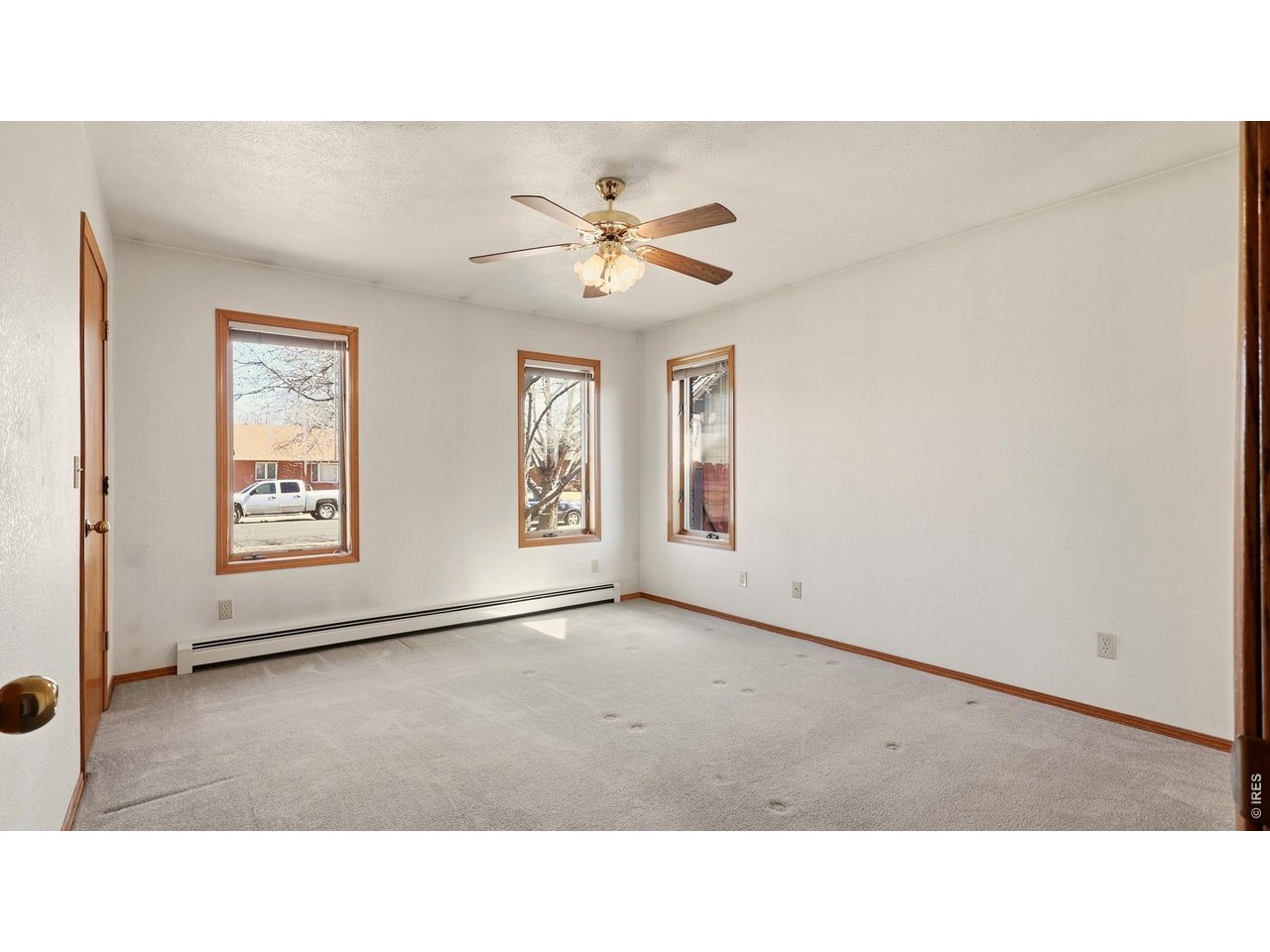 705 Ute Street Fort Morgan, CO 80701 - Photo 14 of 33 a black and white photo of a living room