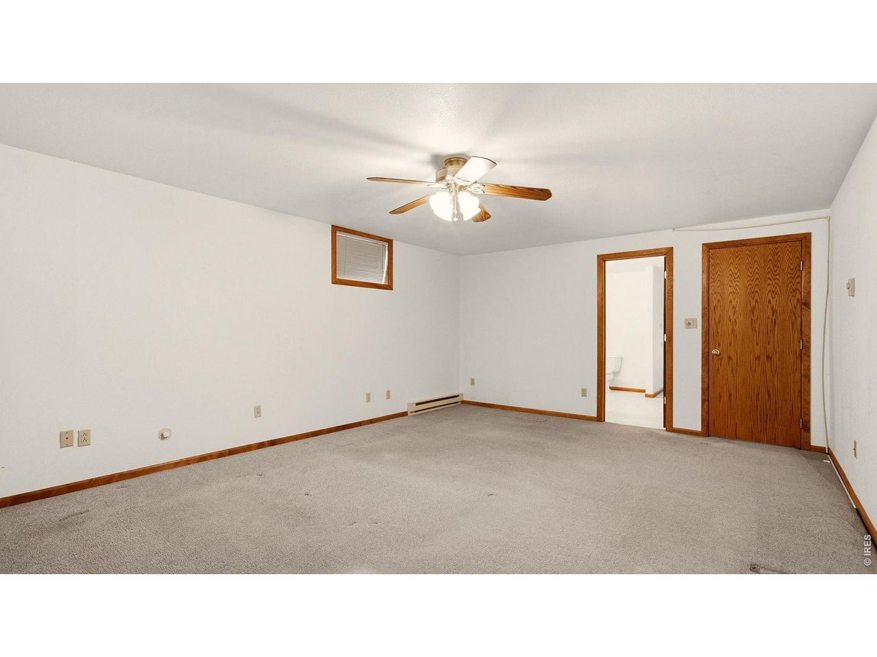 705 Ute Street Fort Morgan, CO 80701 - Photo 24 of 33 a open hall with a ceiling fan