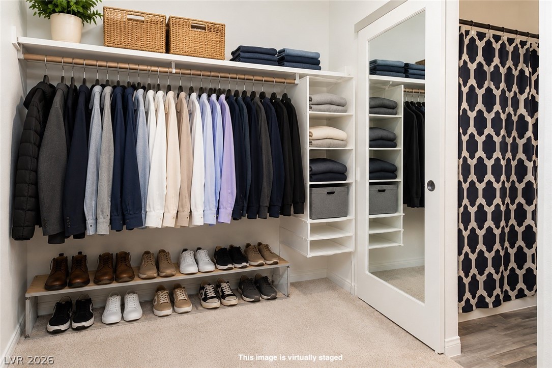 12369 Golden Wreath Road, Unit 2 Las Vegas, NV 89183 - Photo 11 of 19 Customizable closet solutions maximize space with ample shelving and hanging rods.