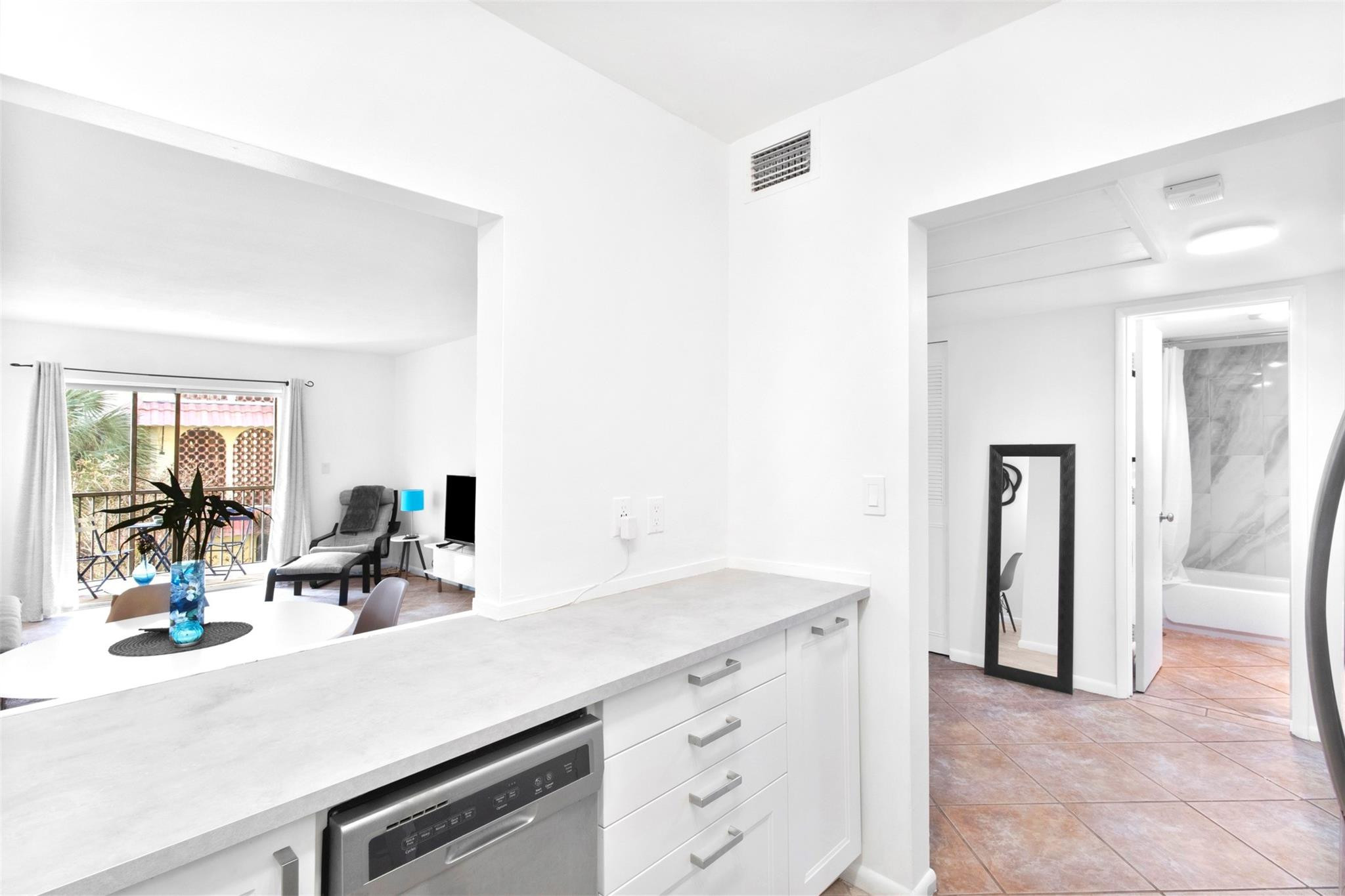 251 South Cypress Road, Unit 127 Pompano Beach, FL 33060 - Photo 10 of 29 Kitchen and Hall