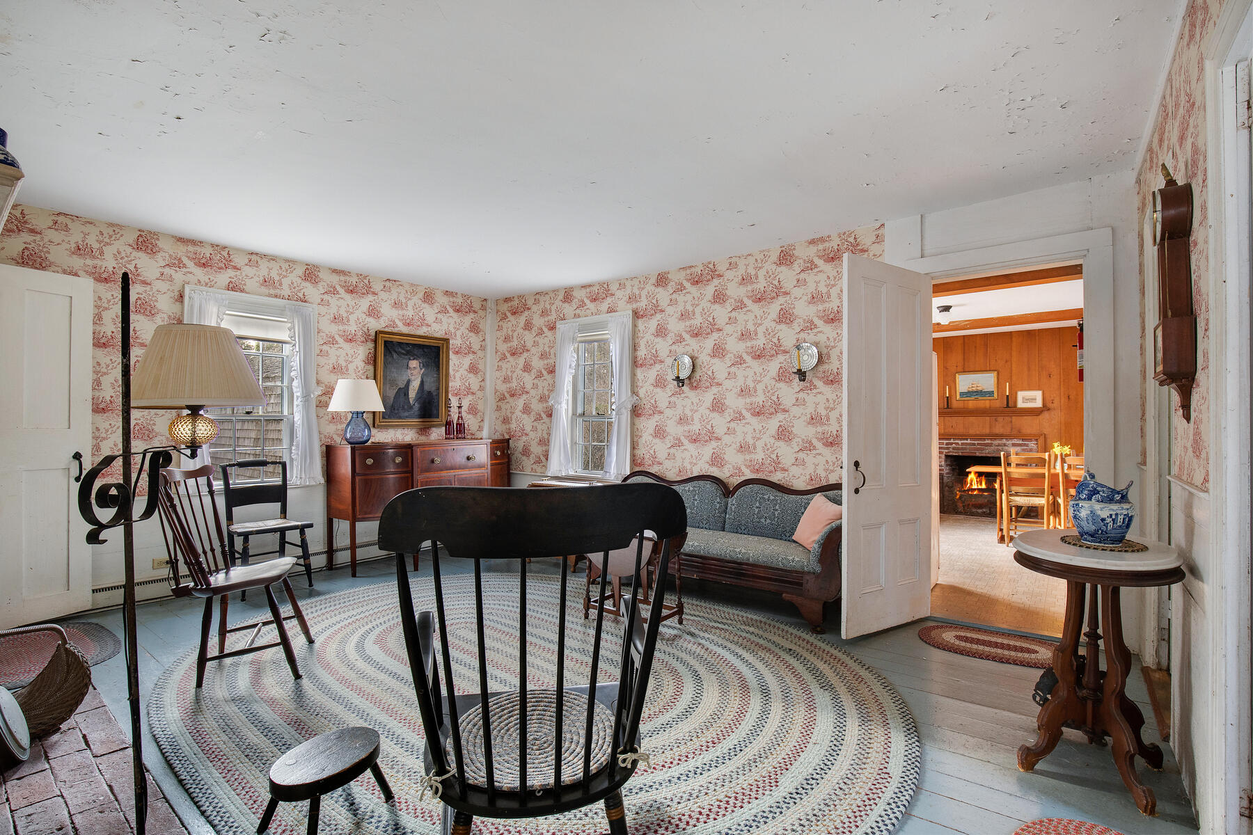 495 Chequessett Neck Road Wellfleet, MA 02667 - Photo 20 of 30 a living room with furniture and a flat screen tv