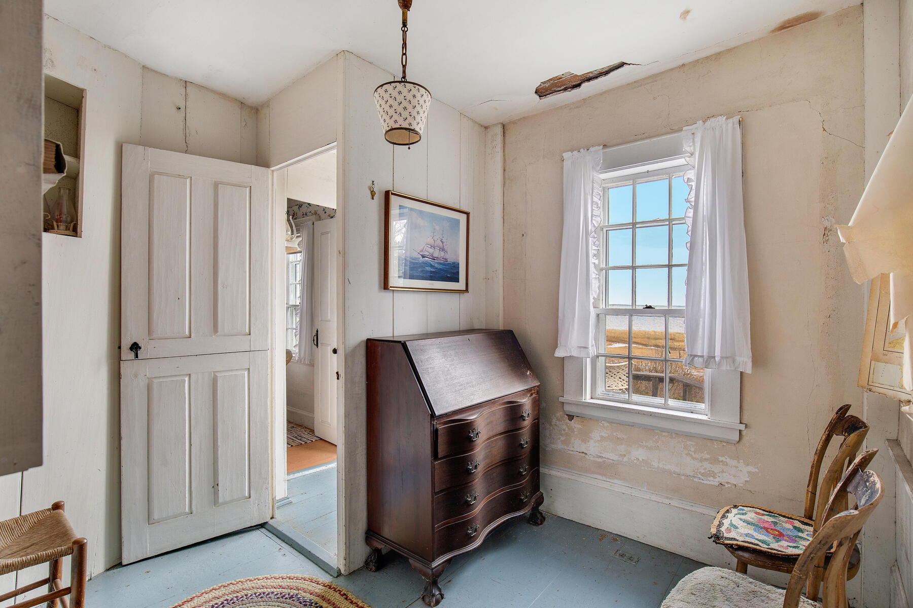 495 Chequessett Neck Road Wellfleet, MA 02667 - Photo 23 of 30 a bedroom with bed and a window