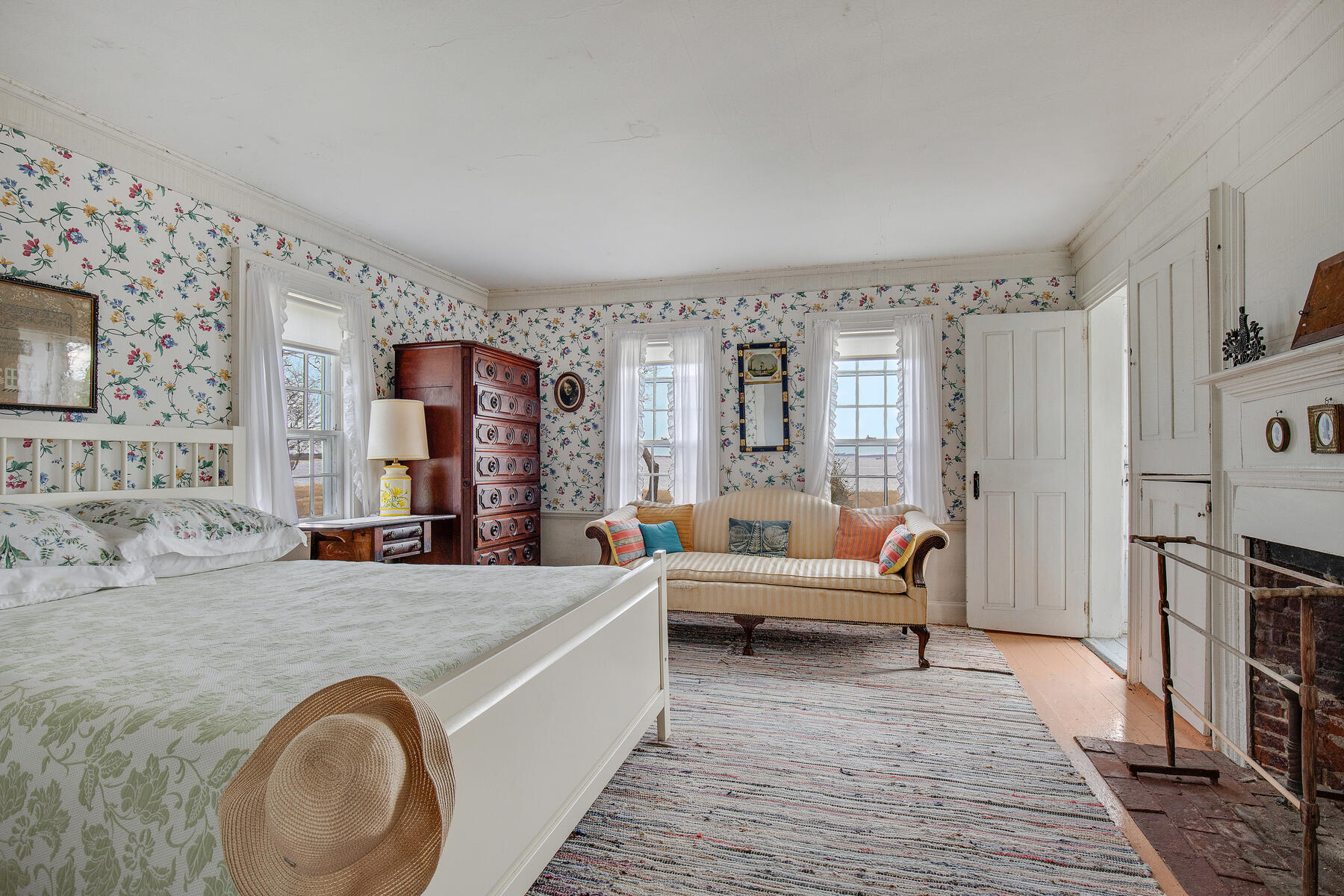 495 Chequessett Neck Road Wellfleet, MA 02667 - Photo 24 of 30 a living room with furniture and a wooden floor
