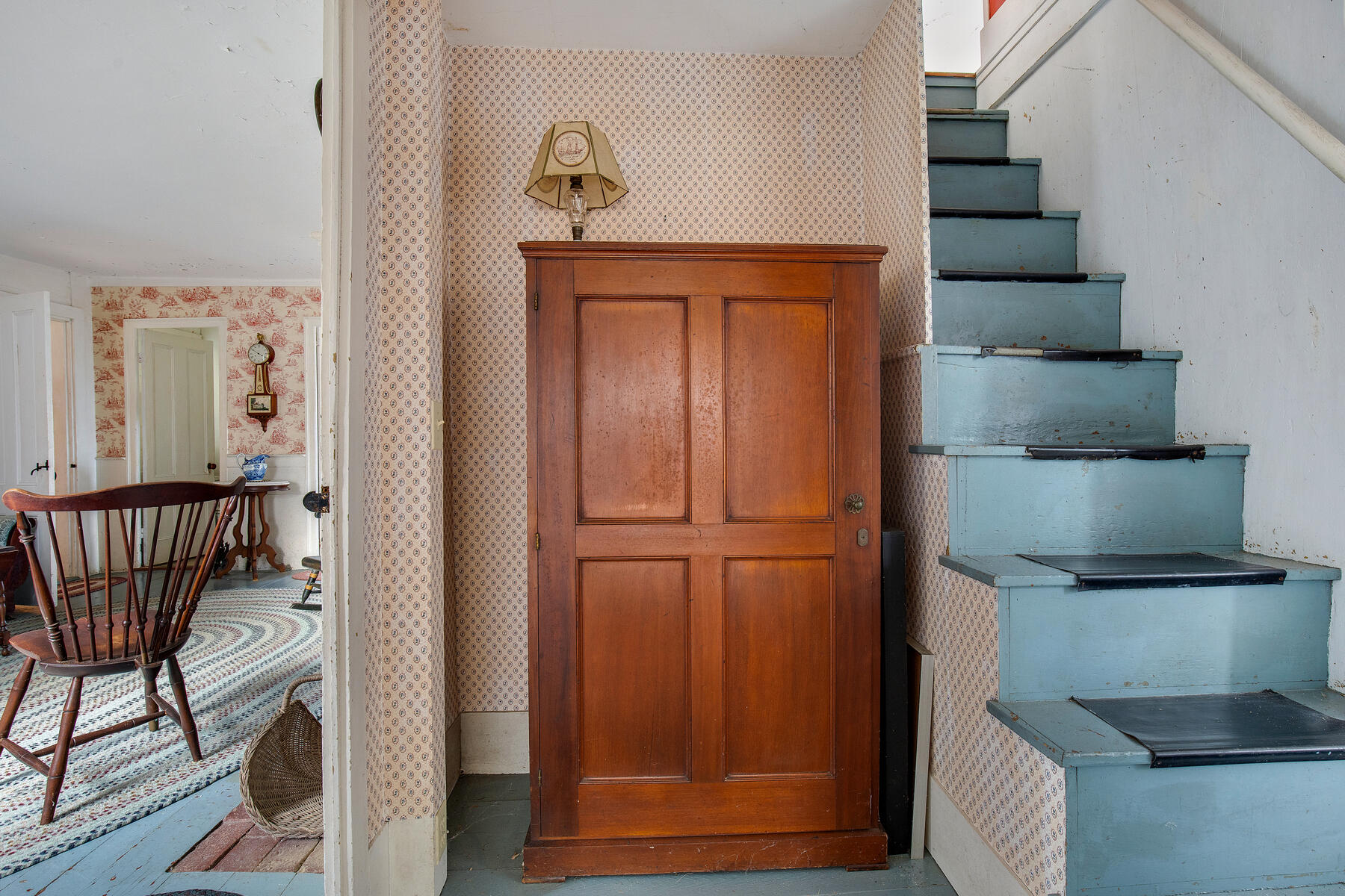 495 Chequessett Neck Road Wellfleet, MA 02667 - Photo 26 of 30 a view of hallway with wooden floor and cabinet