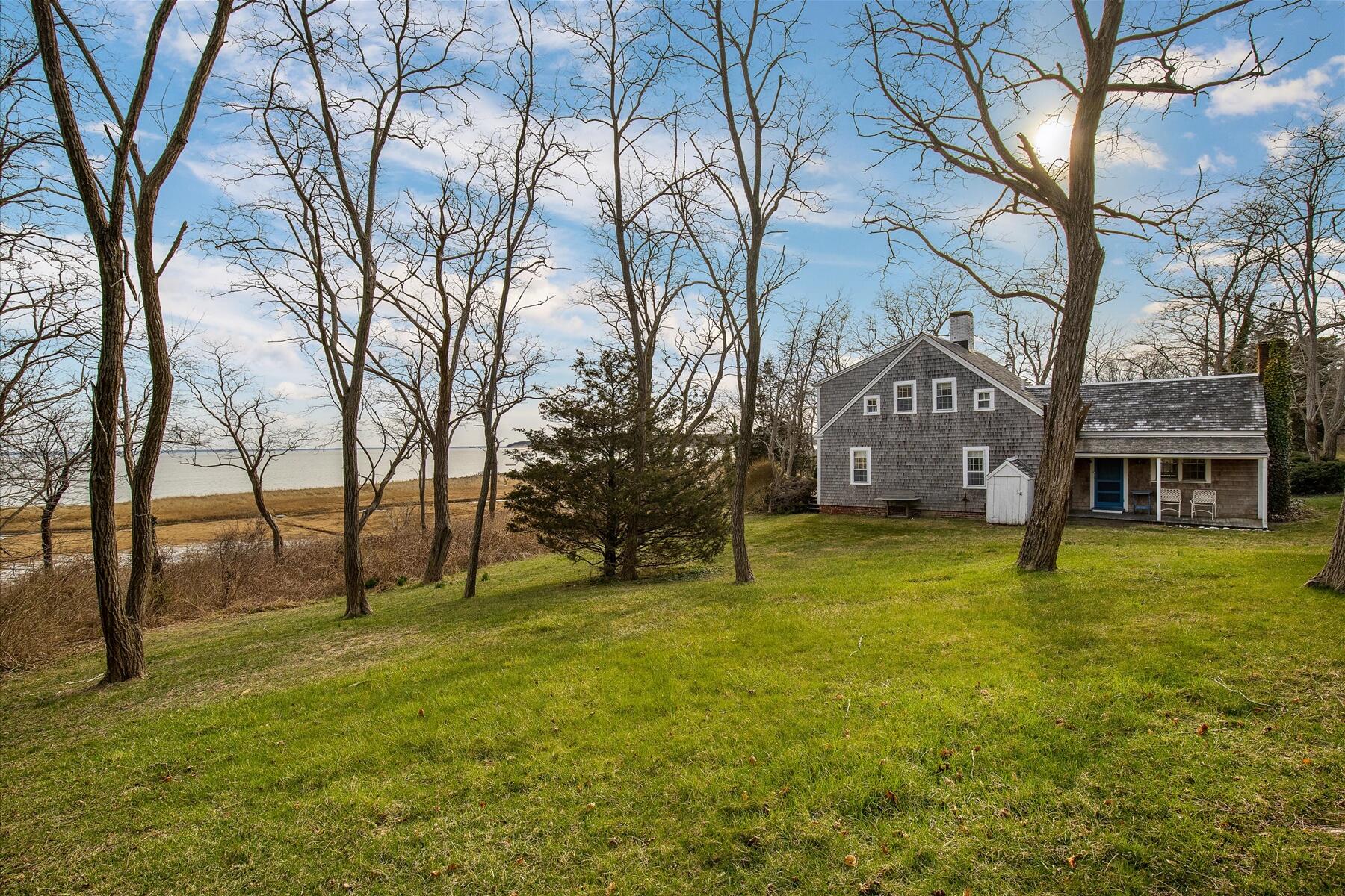 495 Chequessett Neck Road Wellfleet, MA 02667 - Photo 8 of 30 a view of swimming pool with tree s