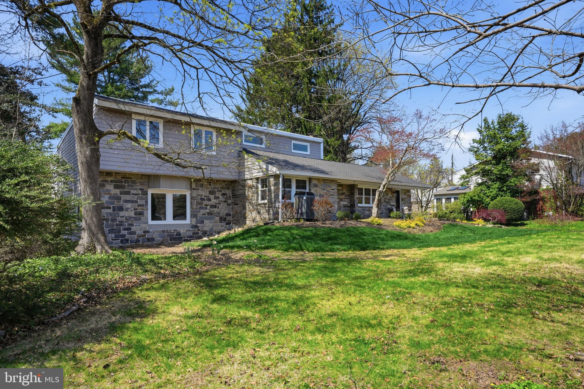 409 South Providence Road Wallingford, PA 19086 - Photo 9 of 106 Charming home nestled in lush greenery.