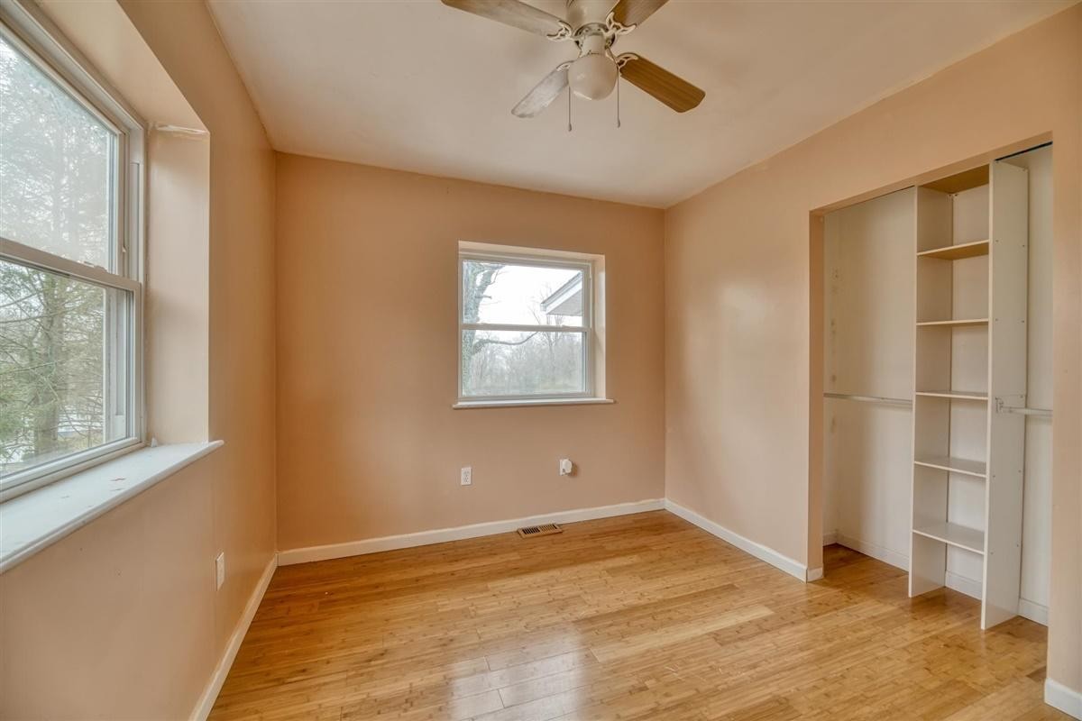 135 Georgia Avenue Oak Ridge, TN 37830 - Photo 24 of 32 a view of an empty room with a window and closet