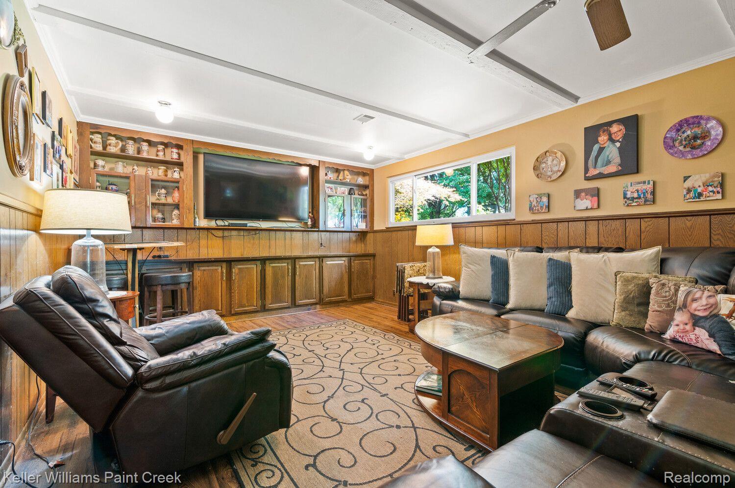 2550 Hessel Avenue Rochester, MI 48307 - Photo 18 of 35 Family Room with Built in cabinets, 70in TV stays