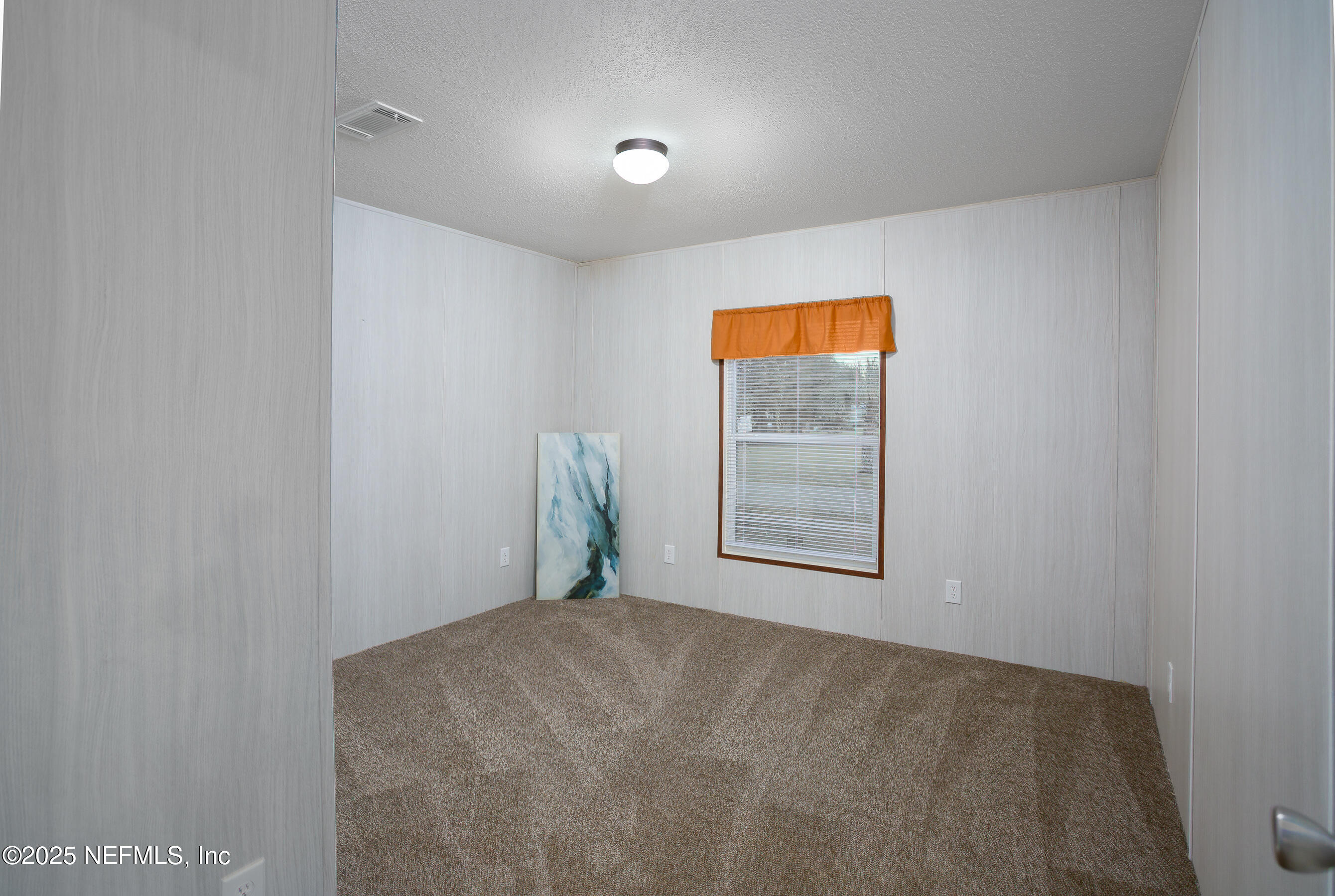 1001 Shell Street Welaka, FL 32193 - Photo 11 of 21 a view of an empty room with a window