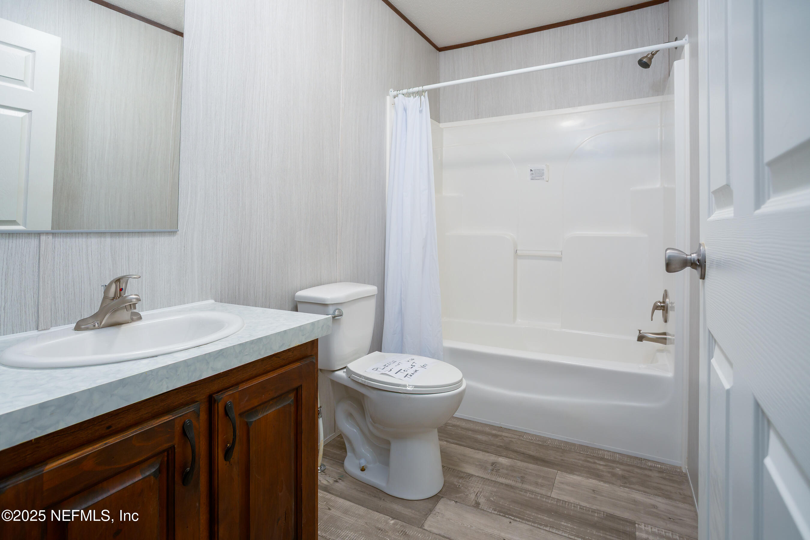 1001 Shell Street Welaka, FL 32193 - Photo 13 of 21 a bathroom with a sink toilet and shower