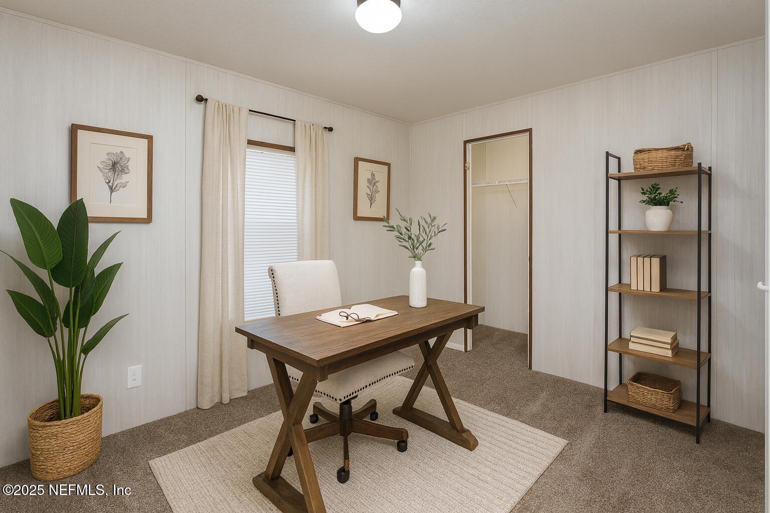 1001 Shell Street Welaka, FL 32193 - Photo 22 of 28 a view of a workspace with furniture and a potted plant