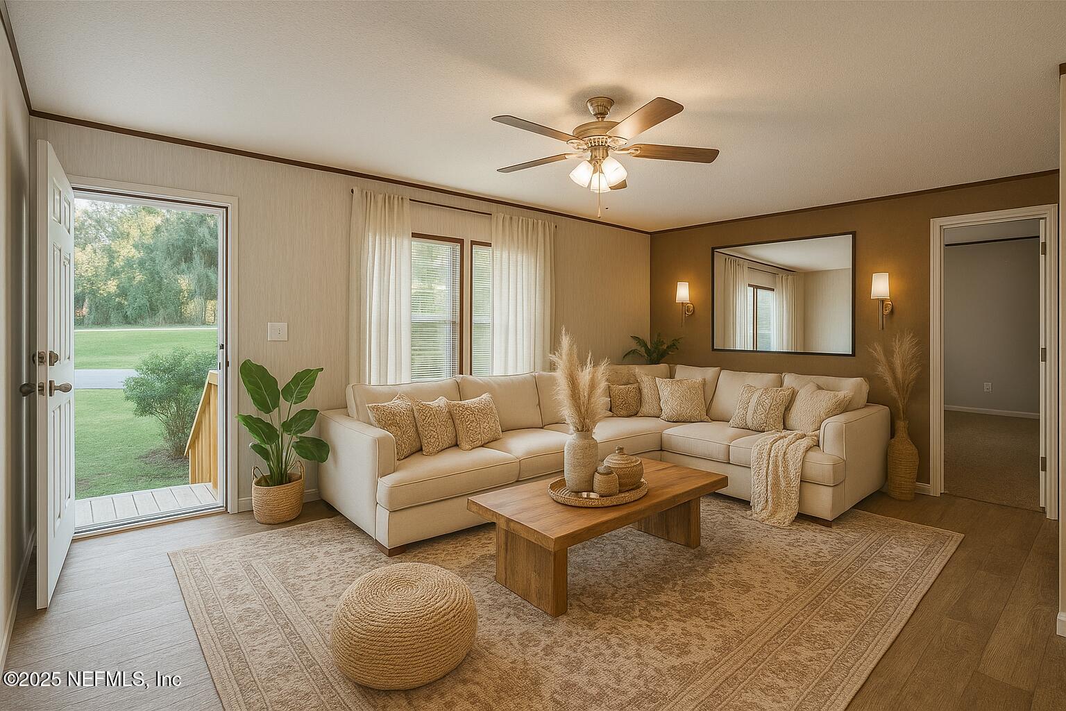 1001 Shell Street Welaka, FL 32193 - Photo 3 of 28 a living room with furniture and a large window